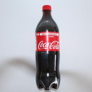 Напиток Кока-Кола сильногазированный,0,9л